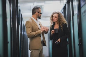 a-couple-of-business-colleagues-officer-talking-an-2025-03-26-09-50-45-utc